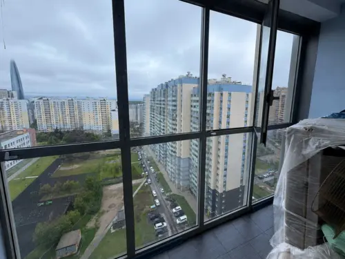 Установка солнцезащитной плёнки STR35SISRPS на панорамное остекление квартиры - фотография 5